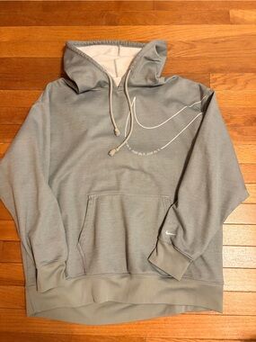 Nike Gray Pullover Hoodie with White Swoosh Accent